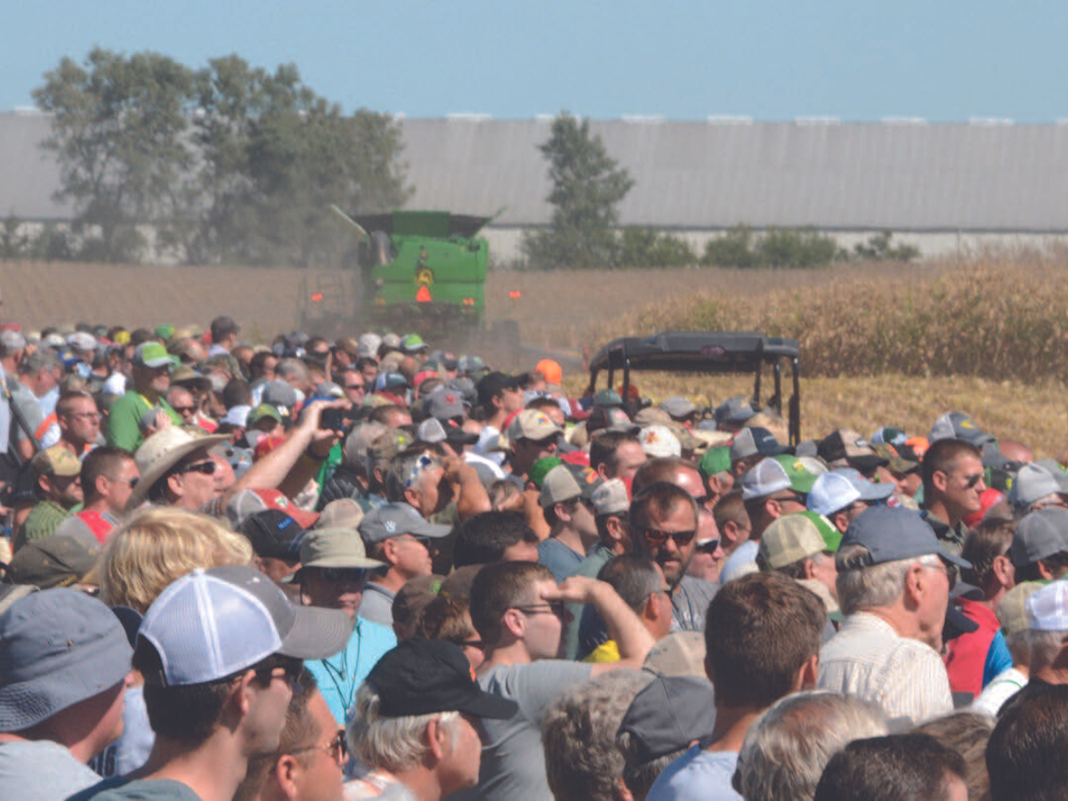 People watching a field demo at the 2019 Farm Progress Show (photo credit: Farm Progress Show)